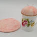 This is a view of the trivet beside the teacup pincushion. This is a view of the trivet beside the teacup pincushion.